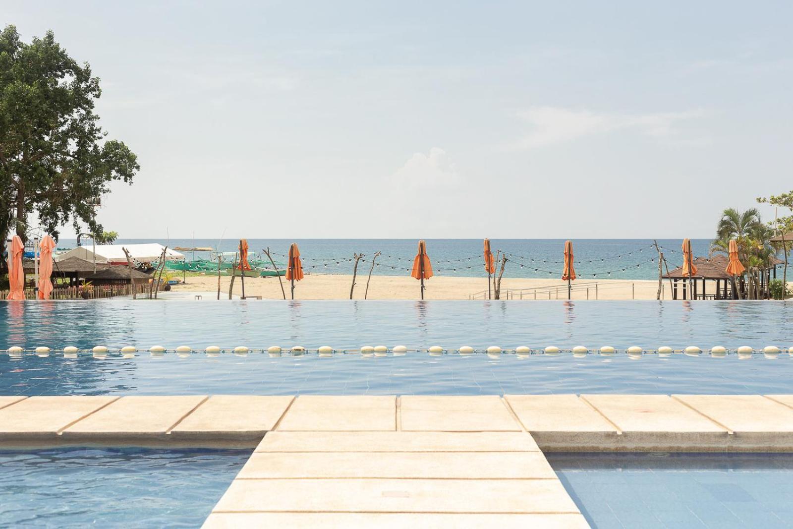 Cocoons Club Laiya Hotel Exterior photo